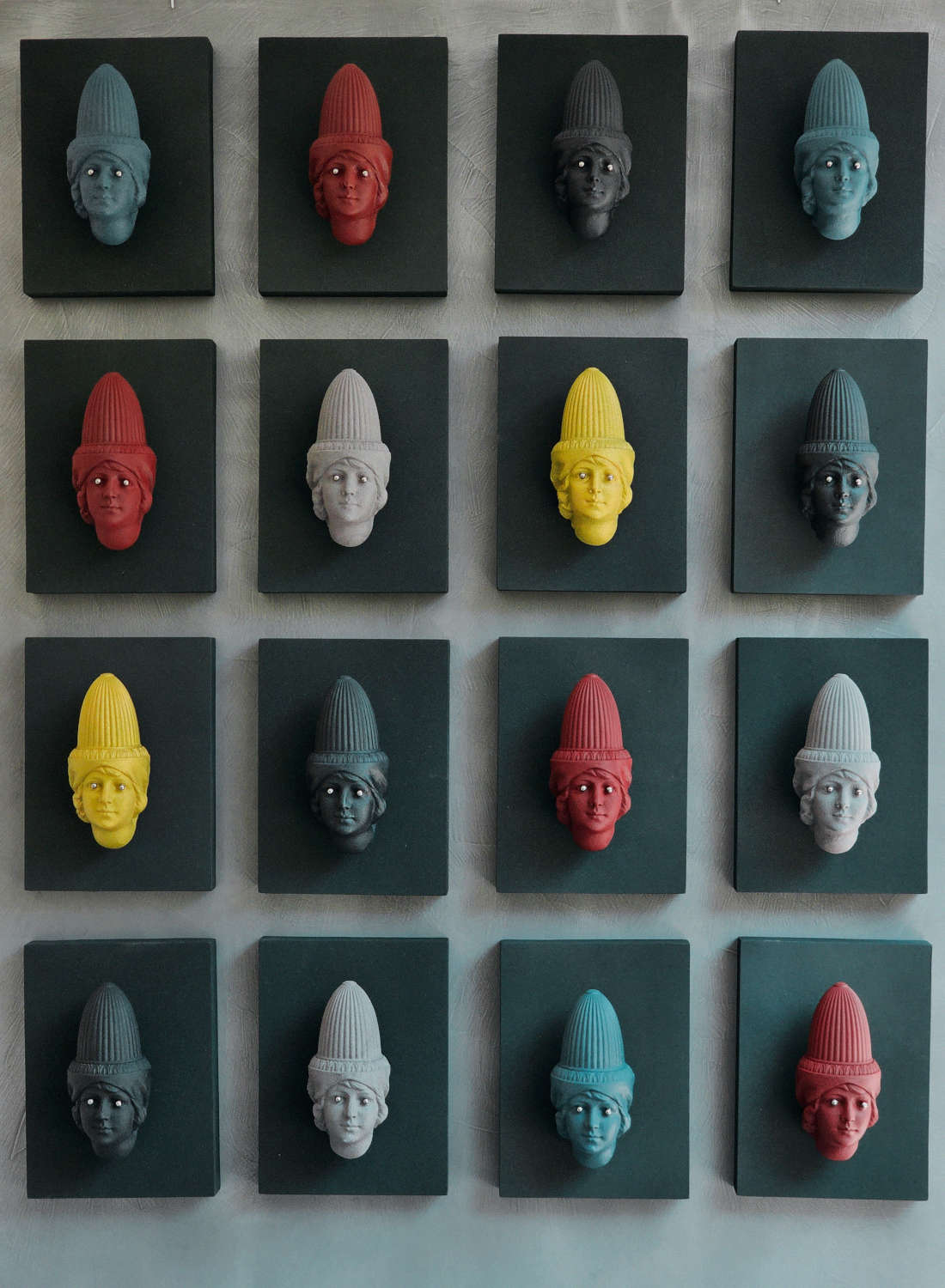 16 heads installation sculptural artwork Dubai