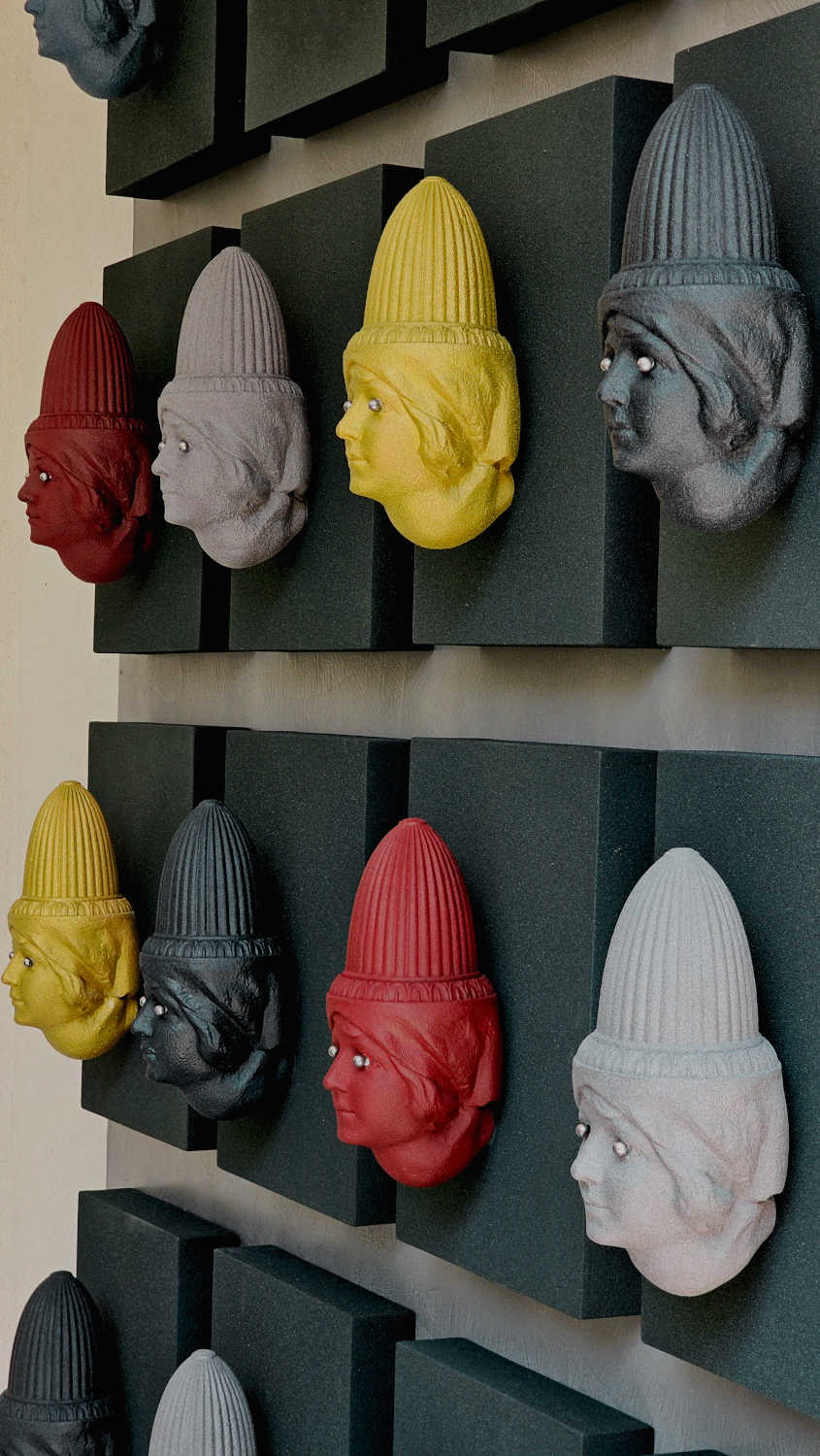16 heads installation sculptural artwork Dubai