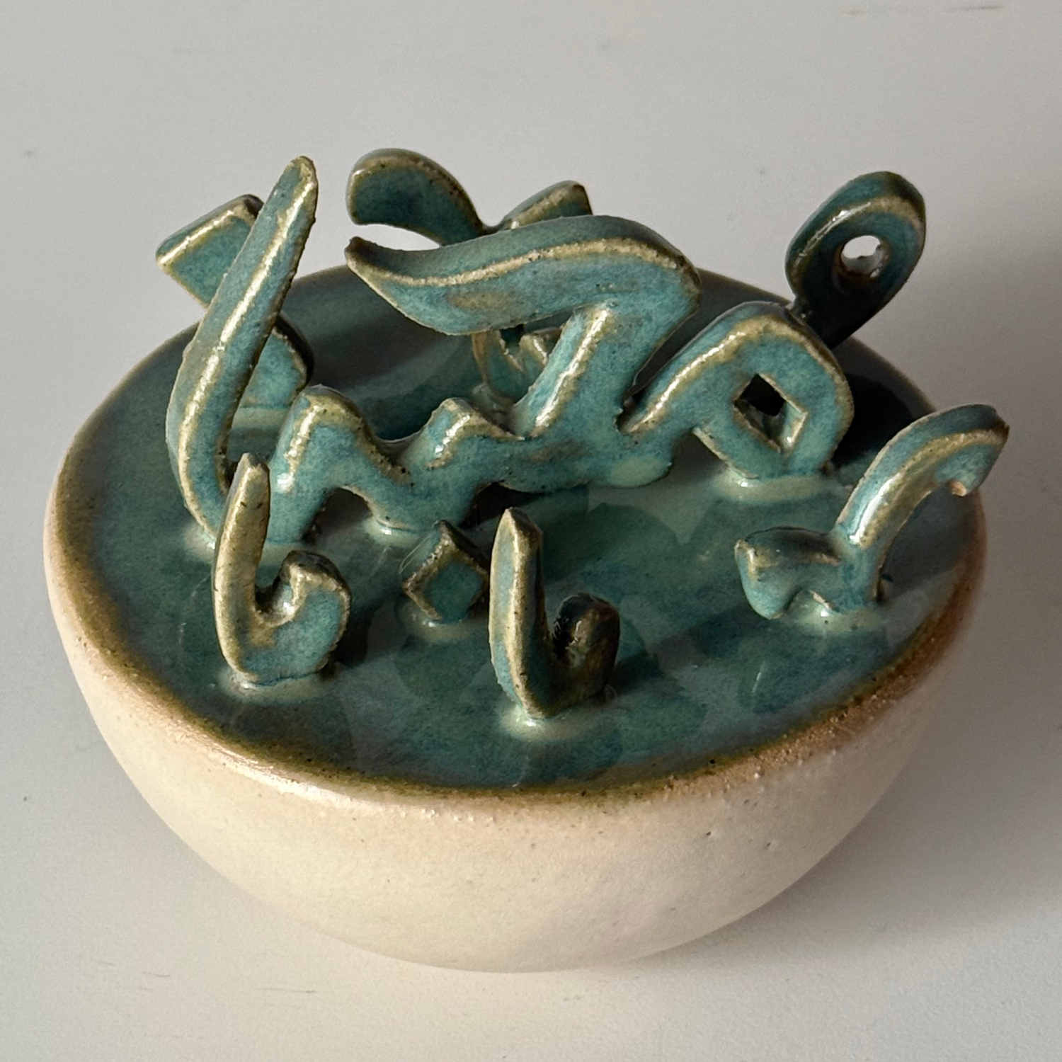Decorative Arabic Calligraphy Ceramic Sculpture By Shamsa Juma