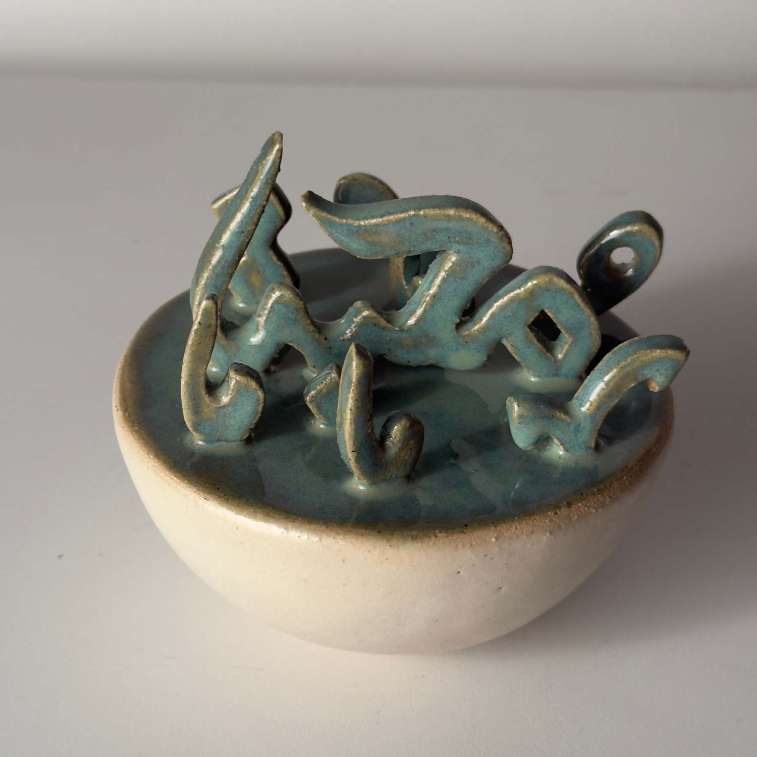 Decorative Arabic Calligraphy Ceramic Sculpture By Shamsa Juma