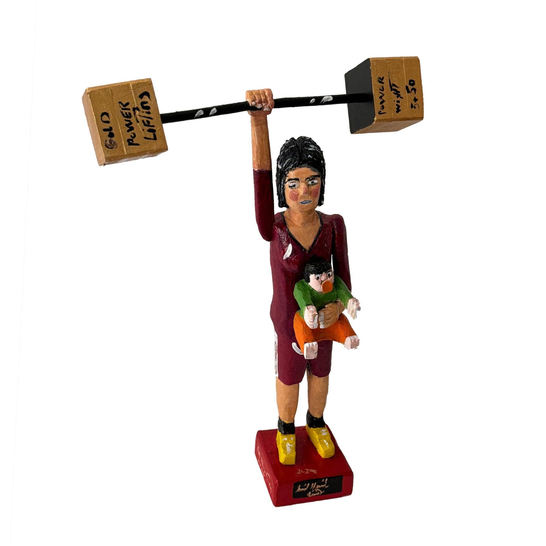 Women's Power Wood Sculpture - Contemporary Wooden Statues & 
Artworks By Amir Kamand in Dubai