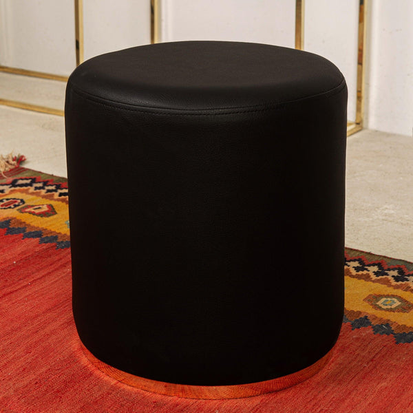 Chic Black Leather Pouf Ottoman with Bronze base in Dubai